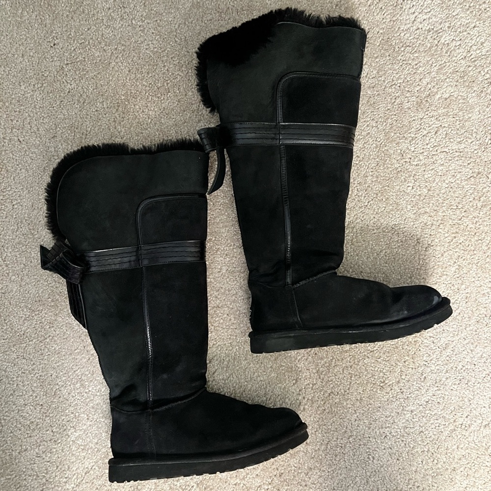 Black Uggs with leather bow